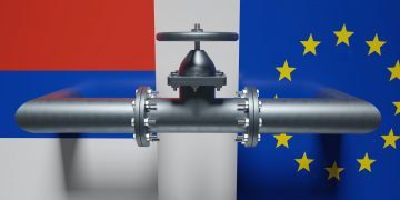 Natural gas transportation in Europe, Gas pipe and valve wheel, Russian and EU flag. 3d render