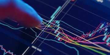 Stock market analysis on digital tablet