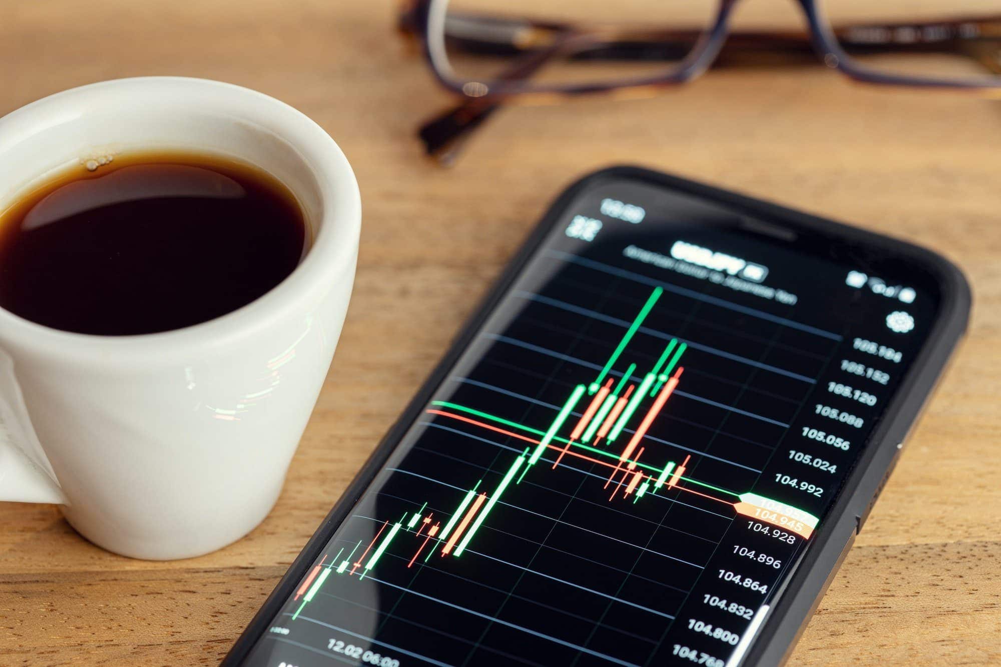 Stock market trading on portable device concept